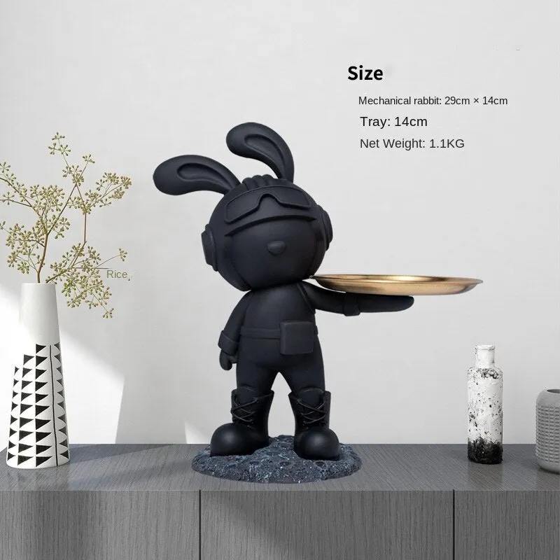 Decorative resin rabbit key storage box for home entry in white colour on a wooden table