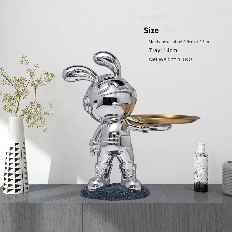 Decorative resin rabbit key storage box for home entry in white colour on a wooden table