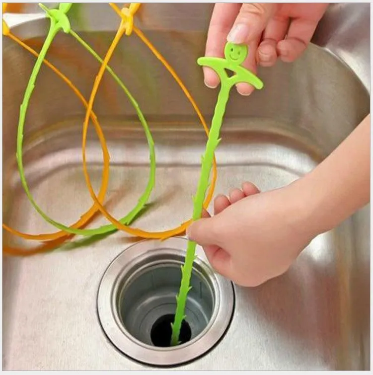 Orange colour kitchen pipe dredging hook made from soft PP, 51 cm long, with a smiling face design