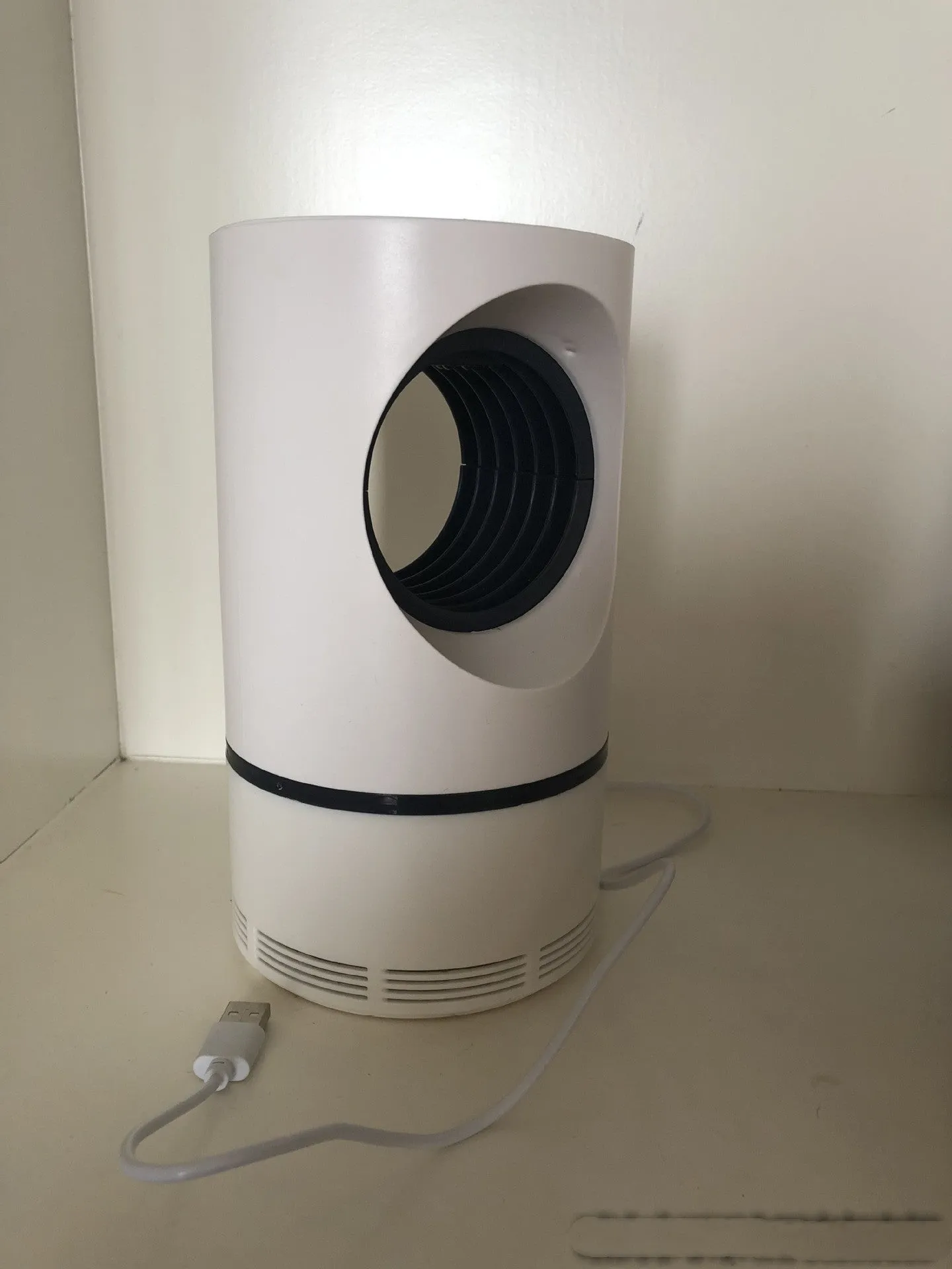 White large bionic mosquito killer lamp with violet light and USB power for indoor use