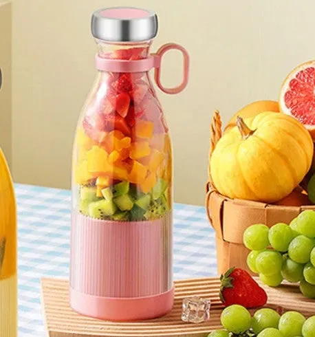 Portable USB charging juice cup in Aquarius Juicer Pink with four cutter heads and PC edible grade plastic inner liner