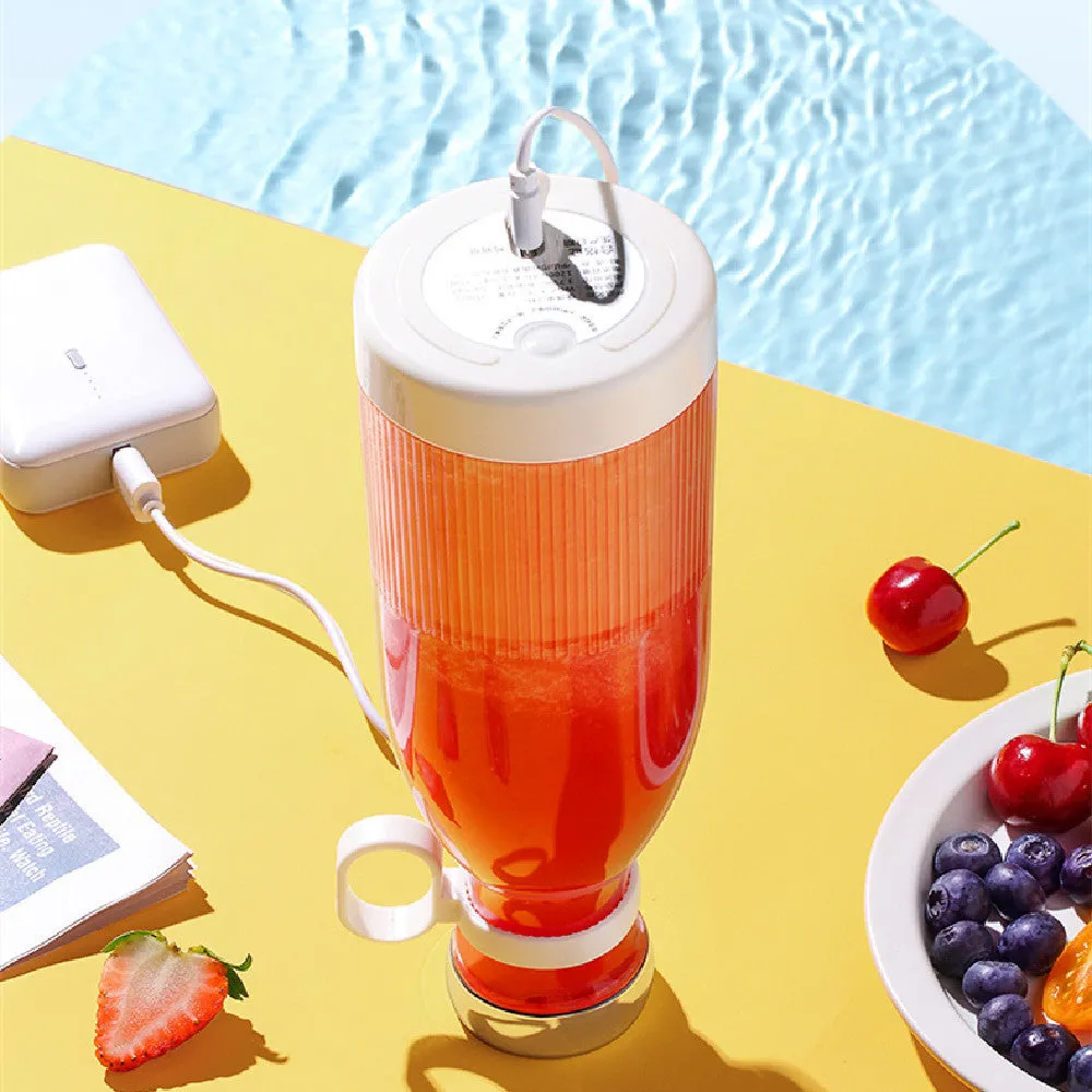 Portable USB charging juice cup in Aquarius Juicer Pink with four cutter heads and PC edible grade plastic inner liner