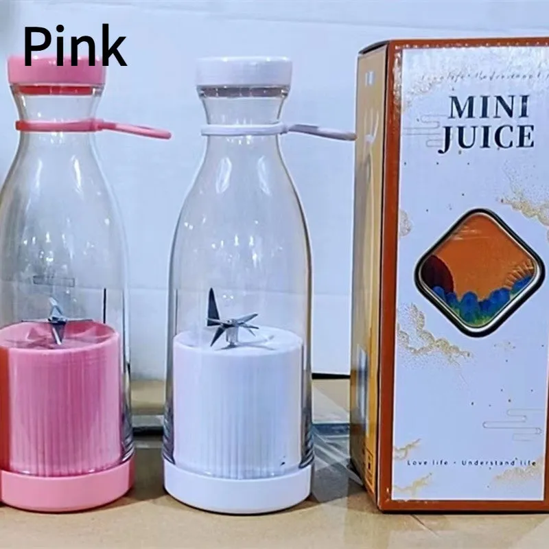 Portable USB charging juice cup in Aquarius Juicer Pink with four cutter heads and PC edible grade plastic inner liner
