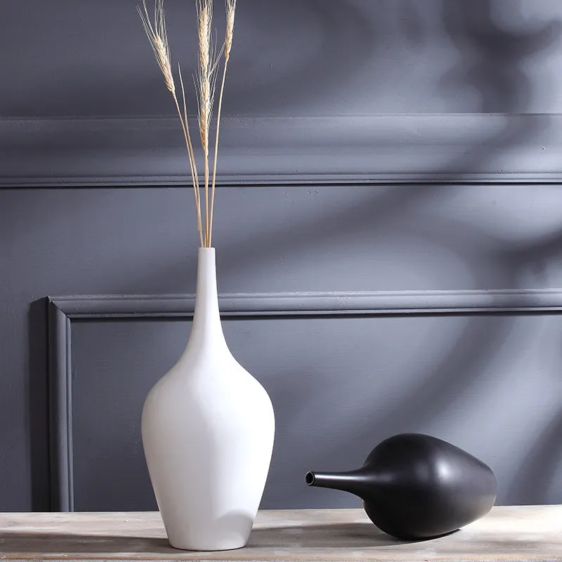 Tall white matte glaze ceramic vase HP160 on desktop with flowers