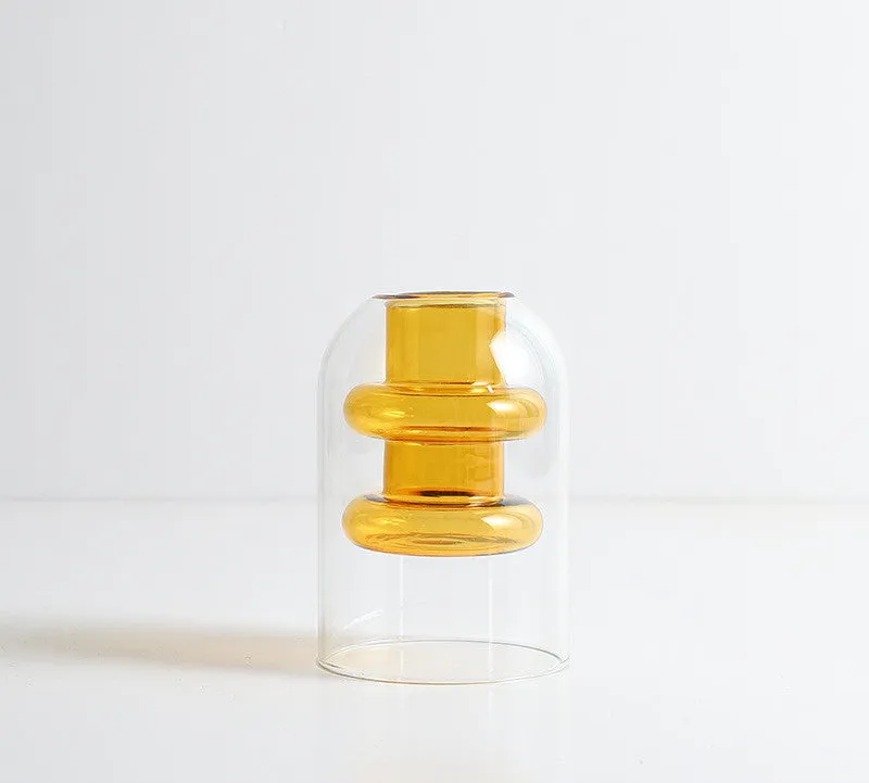 Small colourful double layer blown glass vase for dried flowers, yellow colour option on a table