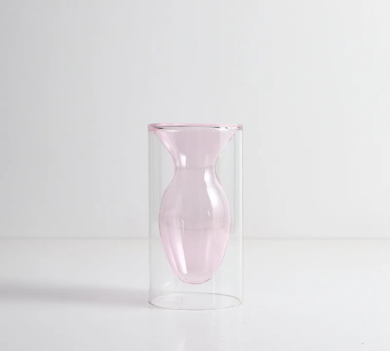 Small colourful double layer blown glass vase for dried flowers, yellow colour option on a table