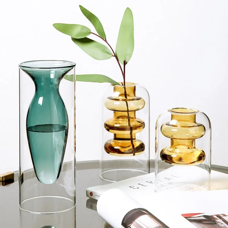 Small colourful double layer blown glass vase for dried flowers, yellow colour option on a table