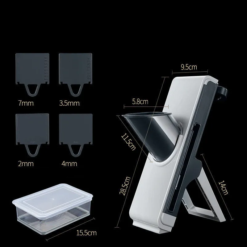 Hand-crank vegetable cutter in simple grey with three blades and fresh-keeping box on a kitchen counter