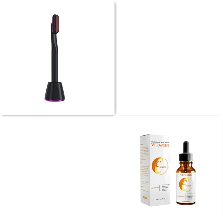 Purple rotary eye massage wand with red LED light and microcurrent on a white background