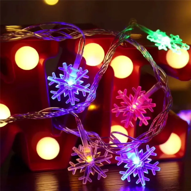 Snowflake string light garlands with PVC lights and remote control in warm white colour for Christmas tree decoration