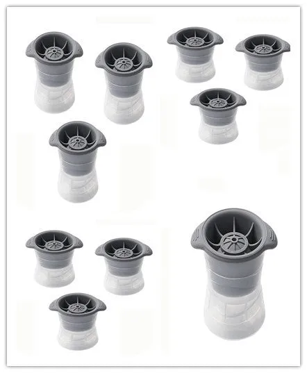 Gray silicone spherical ice ball mould with ABS lid on a kitchen countertop