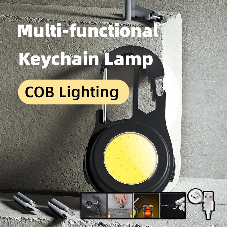 Black 6-in-1 multi-functional mini keychain lamp with COB light and magnetic base on metal surface