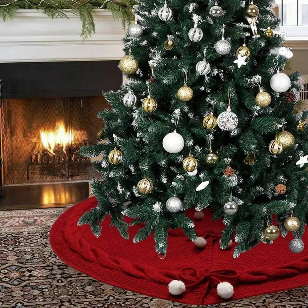 Wine red acrylic Christmas tree skirt 120cm diameter on floor under tree base