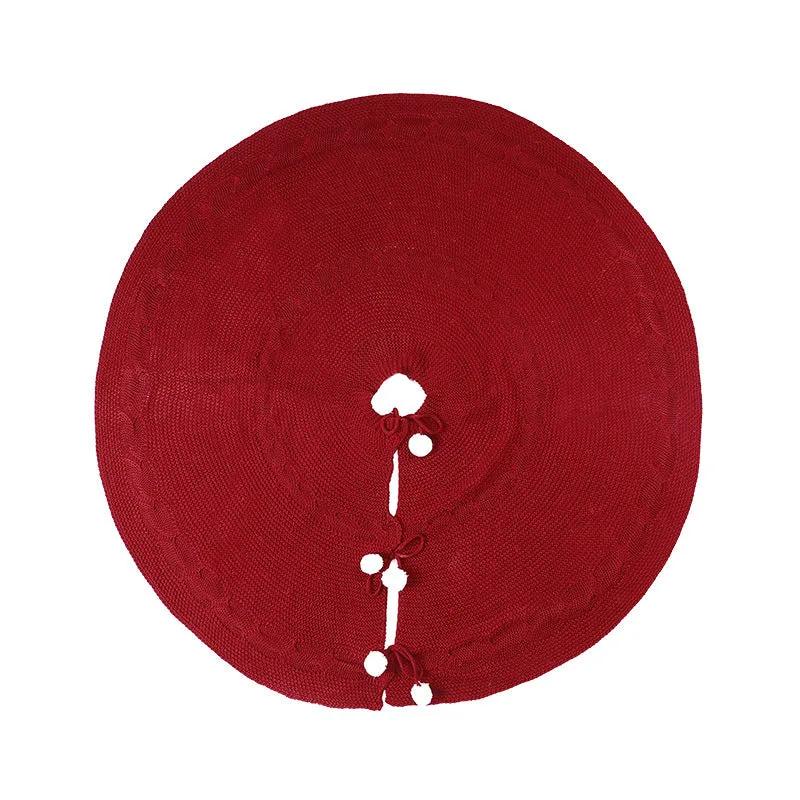 Wine red acrylic Christmas tree skirt 120cm diameter on floor under tree base
