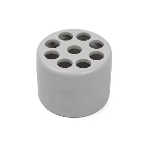Three spiral stem brackets in green, light gray, and yellow placed on a table
