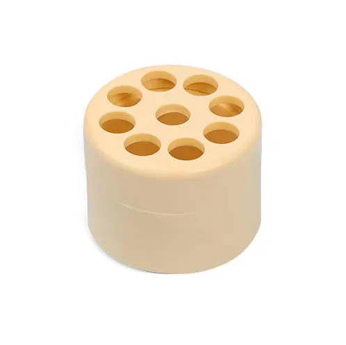 Three spiral stem brackets in green, light gray, and yellow placed on a table
