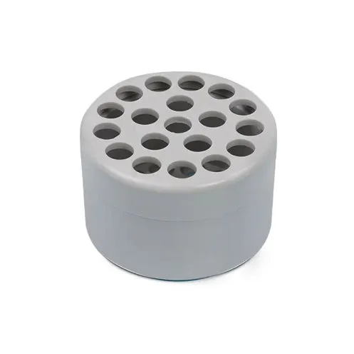 Three spiral stem brackets in green, light gray, and yellow placed on a table
