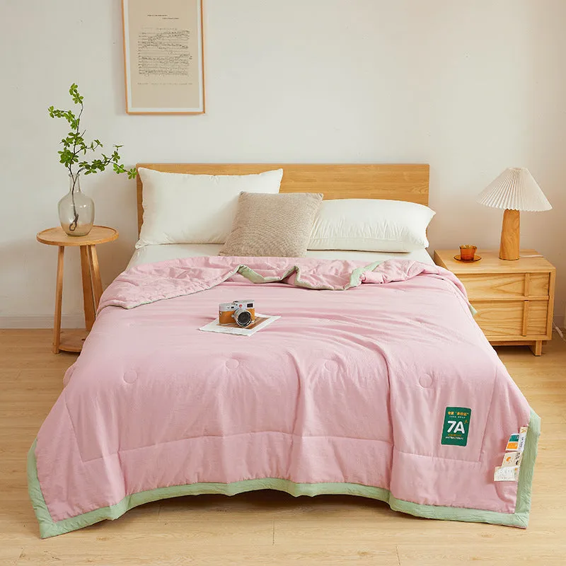 Antibacterial raw cotton washable summer cool quilt in Haze Blue colour, showing quilted pattern and fabric texture