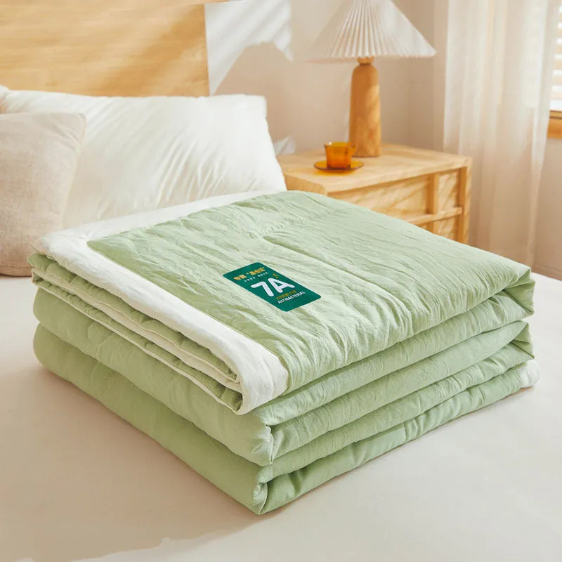 Antibacterial raw cotton washable summer cool quilt in Haze Blue colour, showing quilted pattern and fabric texture