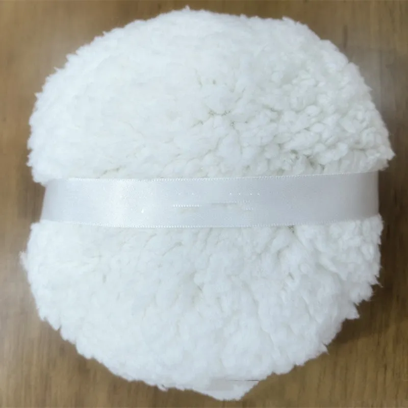 Oversized rectangular plush powder puff in white, skin colour, or pink for makeup application