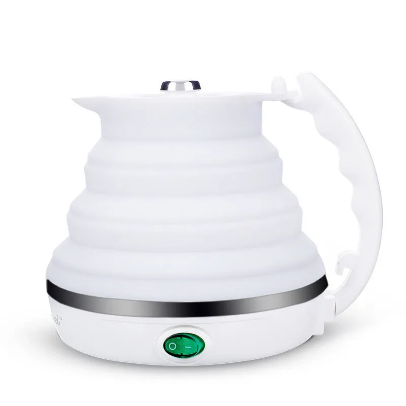 Foldable electric kettle in collapsed position showing compact 50mm height, silicone body, and power cord
