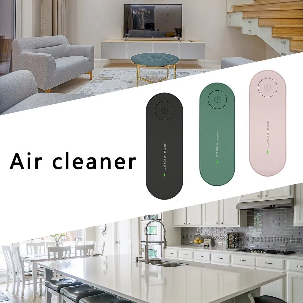 Small negative ion air purifier in black, plugged into a wall socket, with a room in the background
