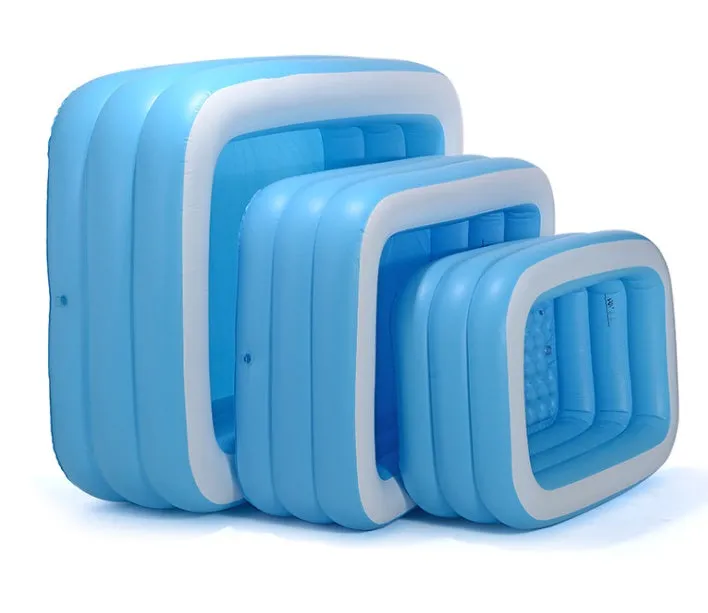 Blue and white rectangular inflatable PVC swimming pool 150cm x 110cm x 50cm in a garden setting