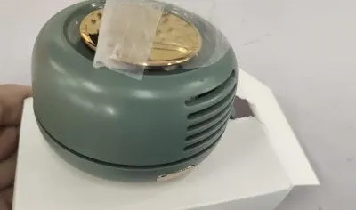 Mini clip fan with flexible clip, 900mAh USB charging, three speed settings in green