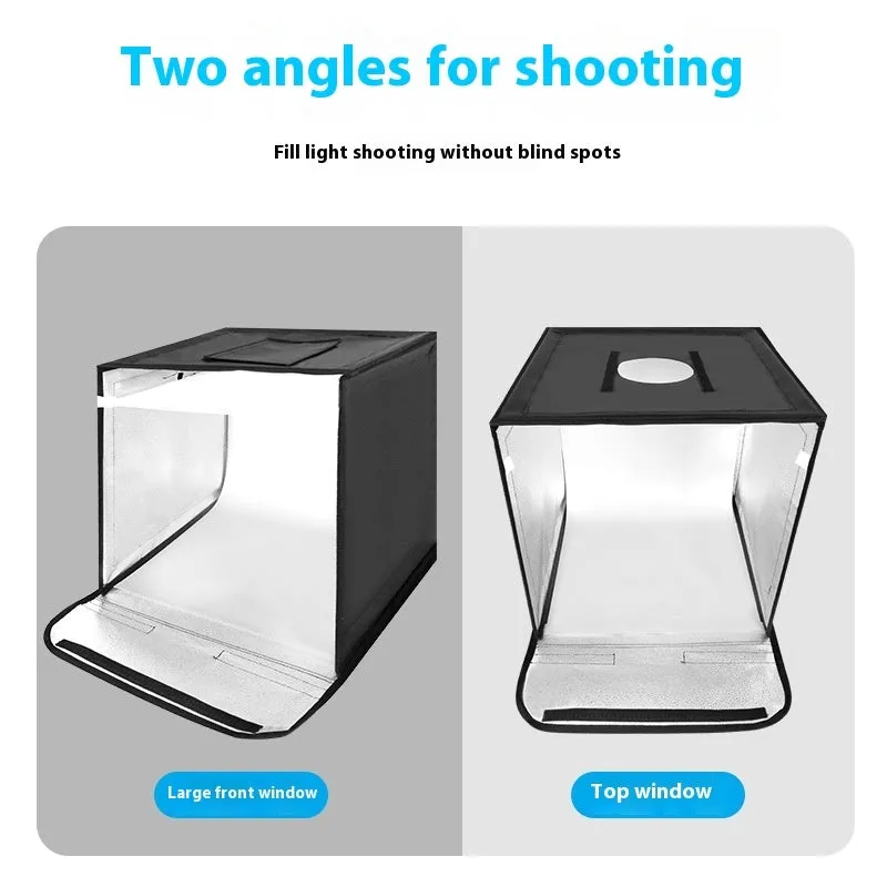 50cm foldable studio light box with LED lights and reflective interior for product photography.
