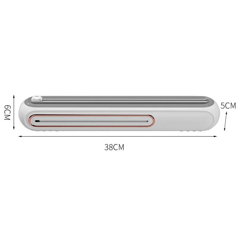 White and blue magnetic cling film cutter hanging on a fridge with a film roll