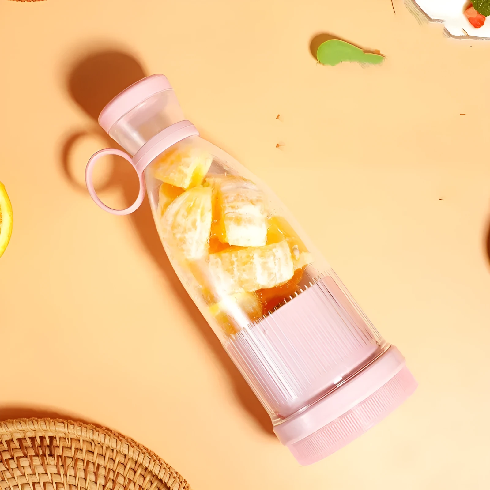 Pink household multi-function mini portable juicer with 380ml capacity and USB charging cable