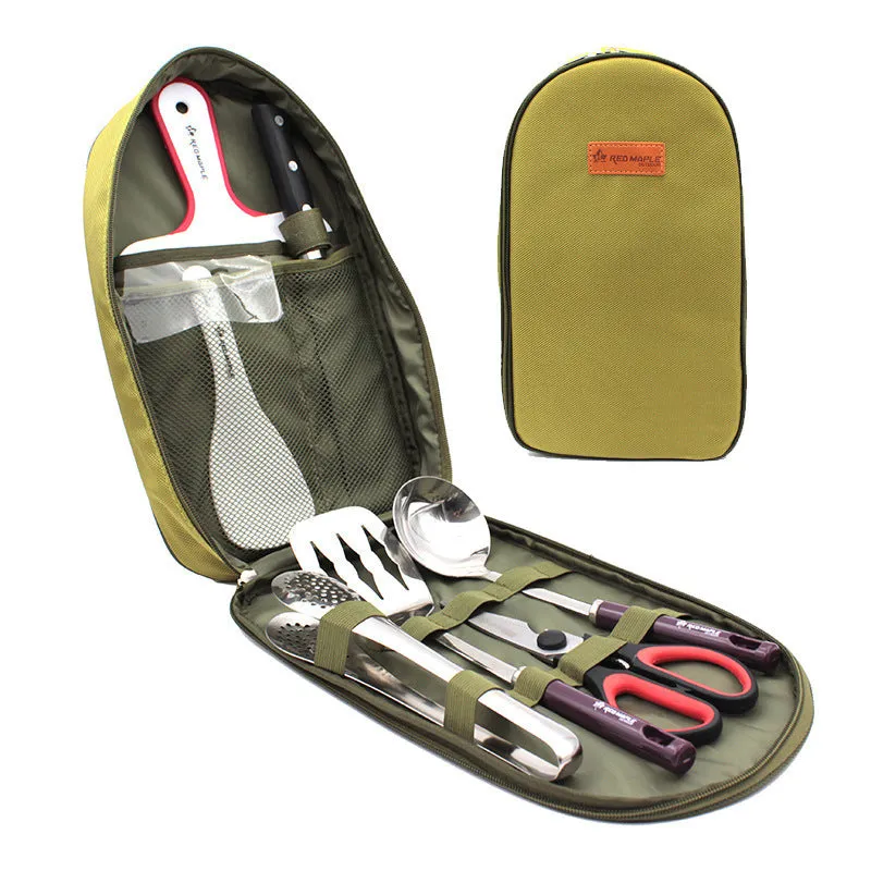 Camp kitchen cooking utensil set 8 pieces stainless steel with oxford storage bag on green background