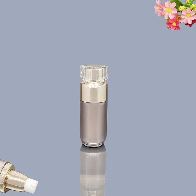 Acrylic cosmetics sub-bottling box with champagne gold and brushed white empty bottles in various sizes