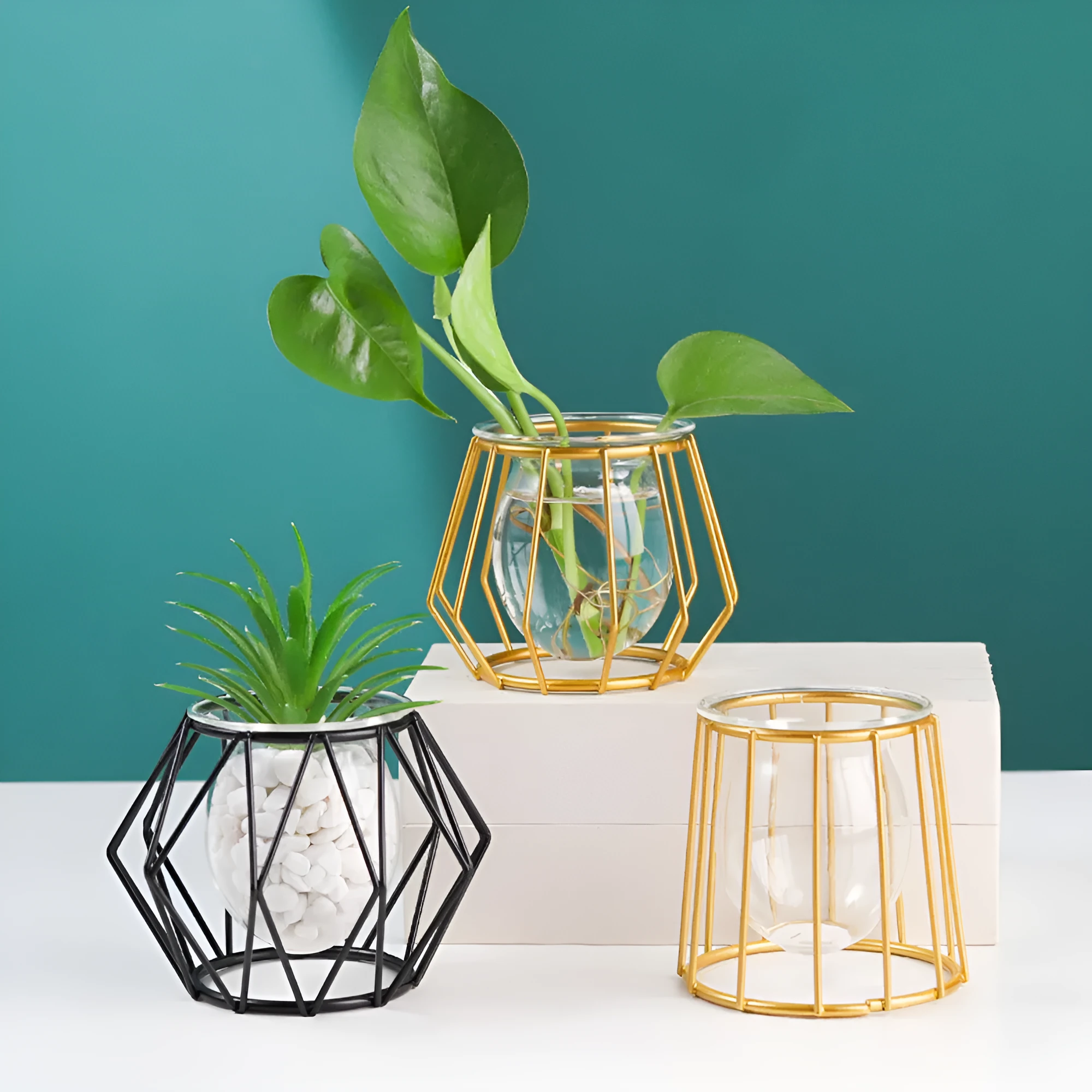 Nordic glass and iron desktop decoration in diamond gold shape on a wooden surface