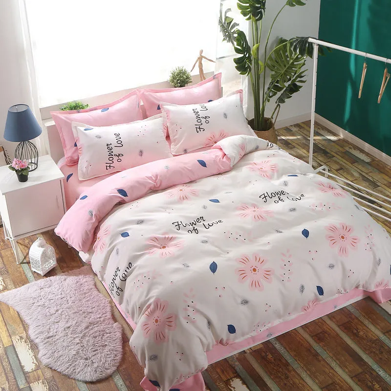 Cotton geometric pattern bedding set with duvet cover, bed sheet, and pillowcases on a bed