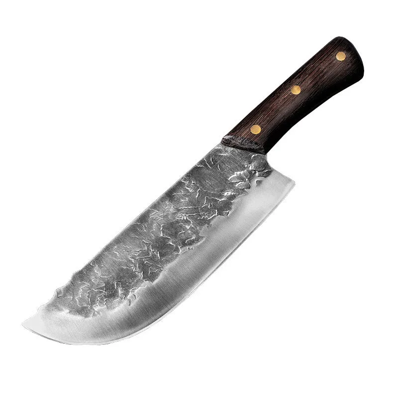 Hand forged stainless steel butcher knife with chicken wing wood handle and copper nails on a cutting board
