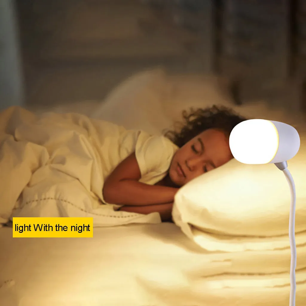 Three-in-one night light wireless speaker charger light in black with step-less dimming and Qi charging pad