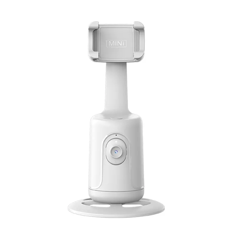 Automatic tracking stabiliser with 360-degree rotation in black, pink, and white on a desktop