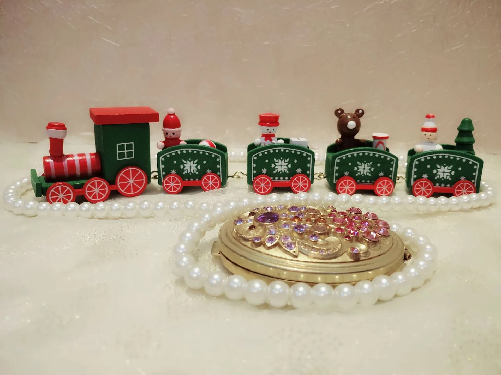 Handcrafted wooden Christmas train ornament in modern simple cartoon style, available in multiple colours