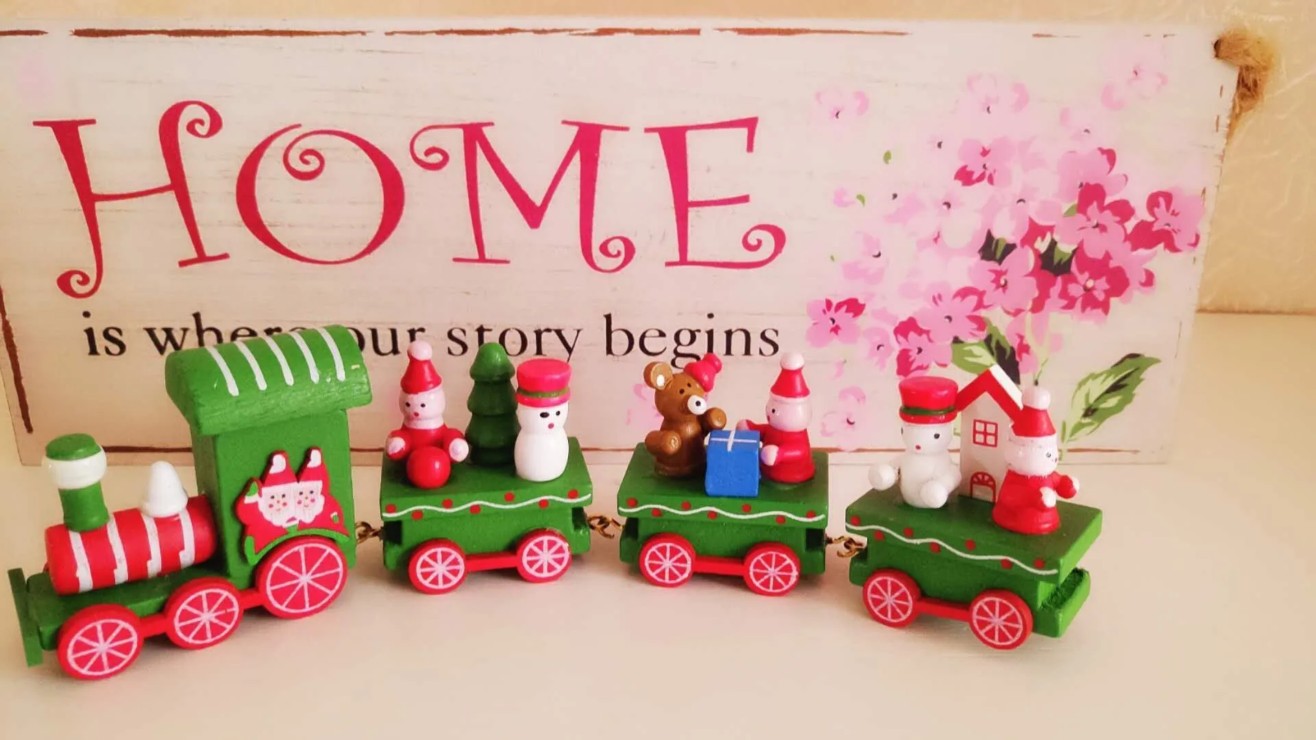 Handcrafted wooden Christmas train ornament in modern simple cartoon style, available in multiple colours