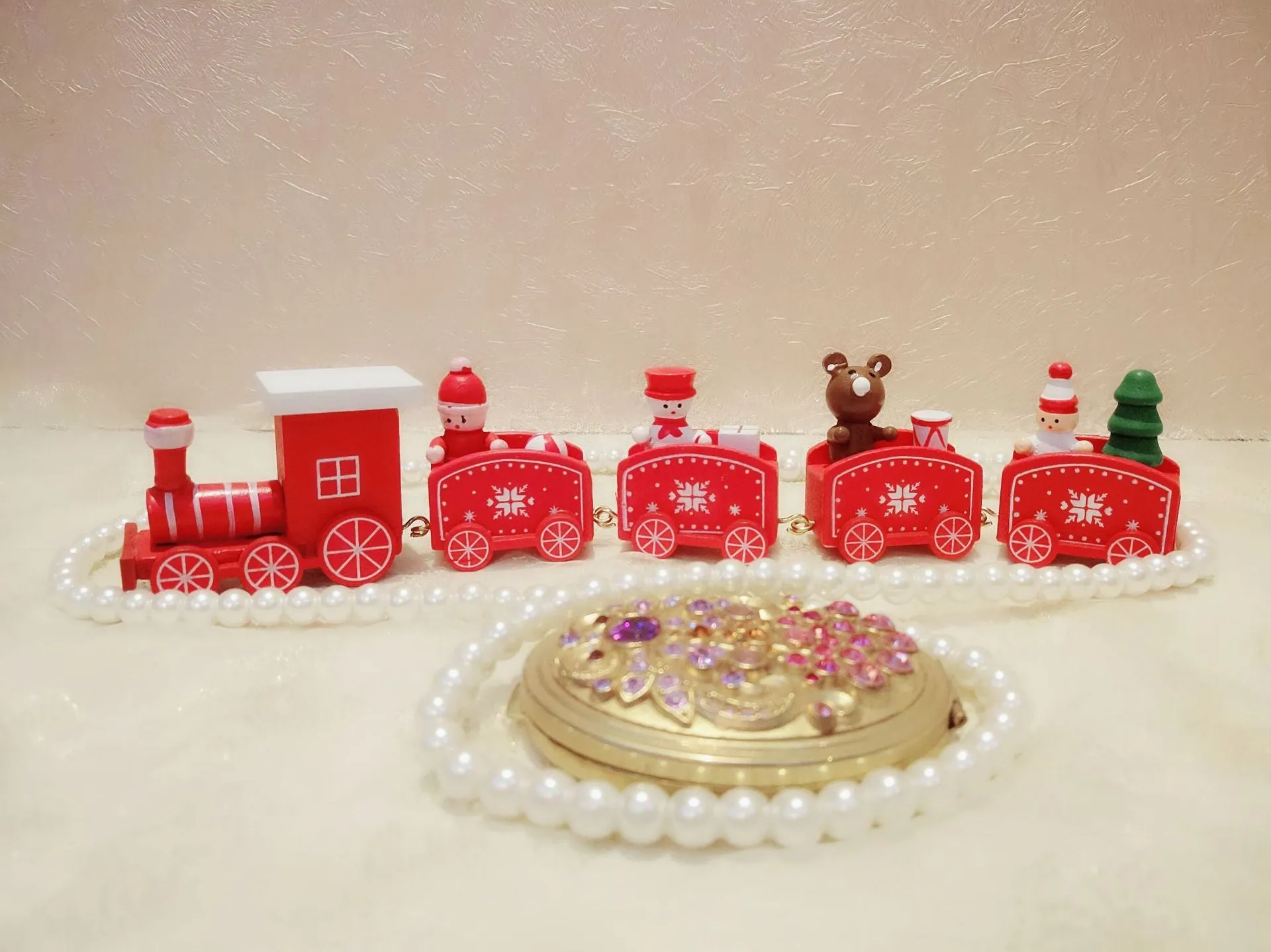 Handcrafted wooden Christmas train ornament in modern simple cartoon style, available in multiple colours