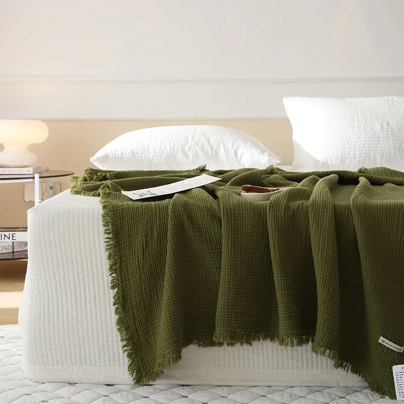 Four-layer cotton gauze blanket with tassel trim in navy blue colour