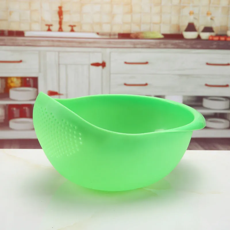 Plastic rice washing sieve in blue on a kitchen countertop with rice grains visible inside