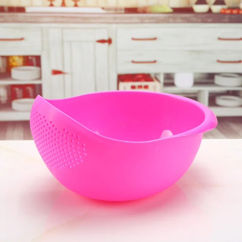 Plastic rice washing sieve in blue on a kitchen countertop with rice grains visible inside