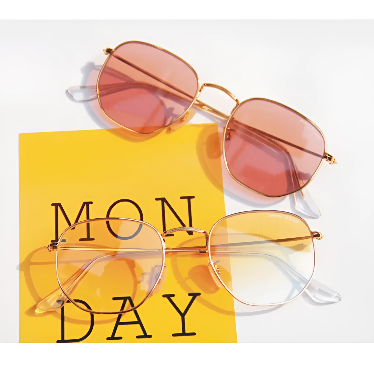 Retro street sunglasses with gold frame and transparent blue resin lenses