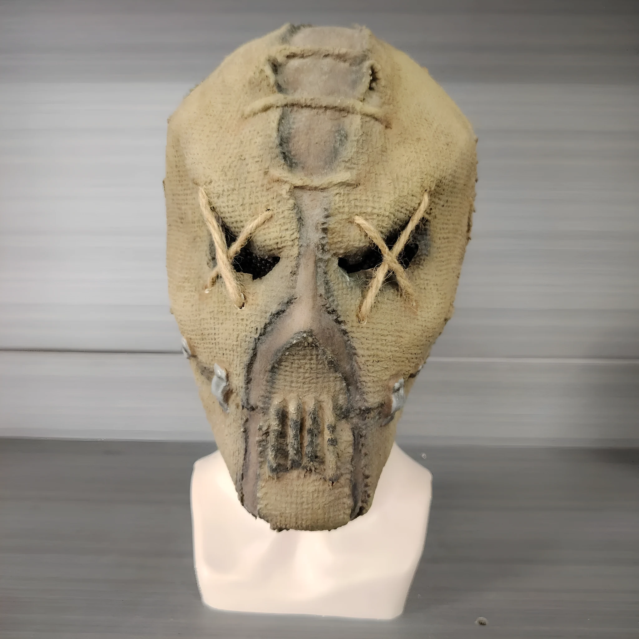 Scar skull design latex Halloween mask for adults measuring 31cm tall with horror styling