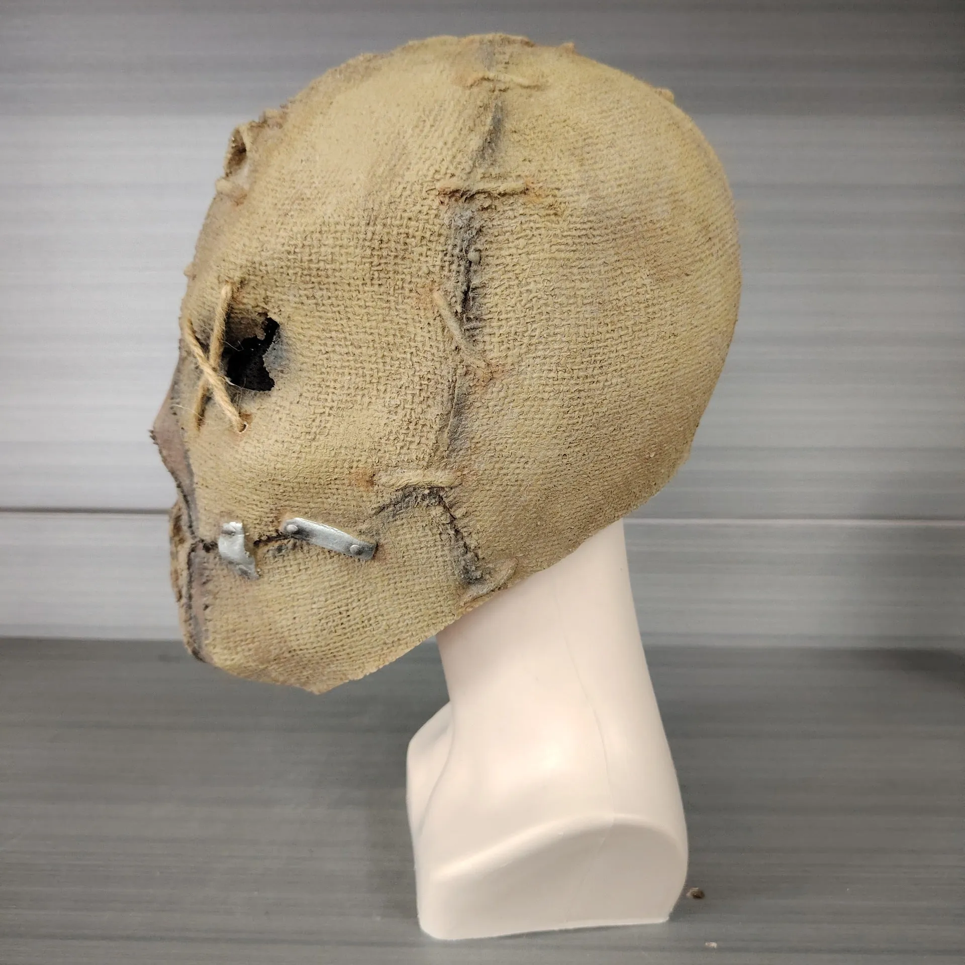 Scar skull design latex Halloween mask for adults measuring 31cm tall with horror styling
