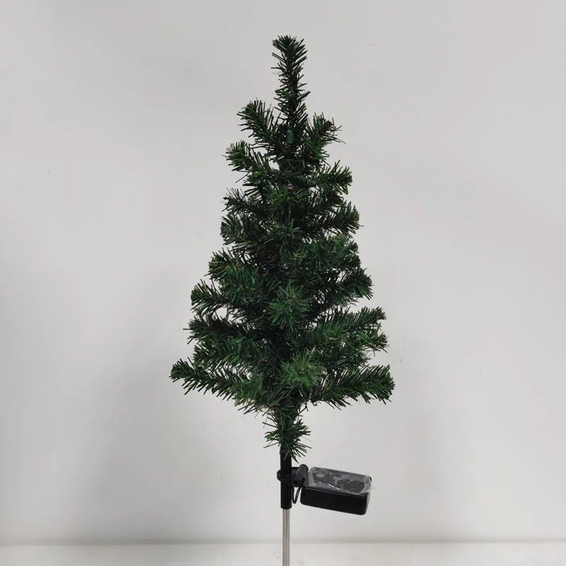 Solar Christmas tree lamp garden decoration with IP65 ABS construction placed in outdoor courtyard