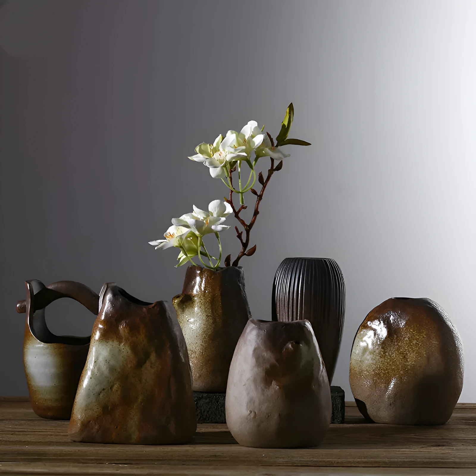 Glazed ceramic small vase in creative Japanese style as decorative ornament with six colour options