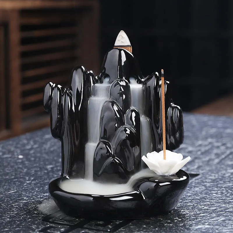 Ceramic backflow incense burner with black glaze finish and waterfall smoke effect